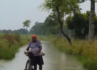 बहराइच में घाघरा की बाढ़ ने दी दस्तक:धर्मपुर रेतिया मार्ग 418 पर पानी बहा, खेतों में भी भरा; आवागमन पर असर