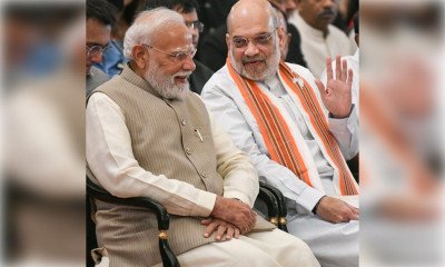 मोदी के जनसेवा में 25 साल पूरे, अमित शाह ने दी बधाई
